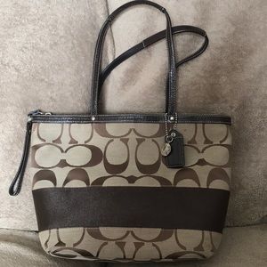 Authentic Coach over the shoulder purse.